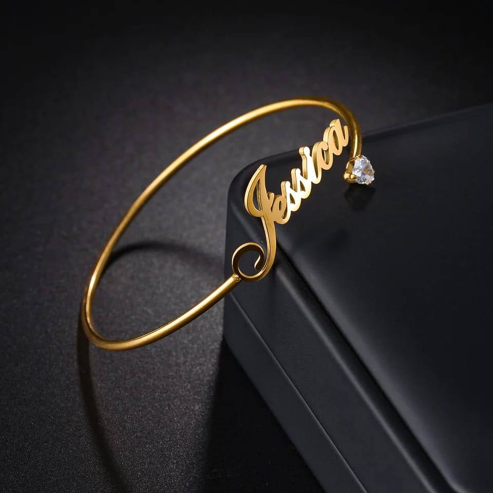 Personalised name adjustable bracelet with optional pearl or gem finishing and font choice