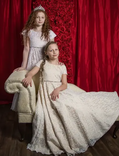 Classic A-line communion embroidered lace gown with short sleeves and gem belt

