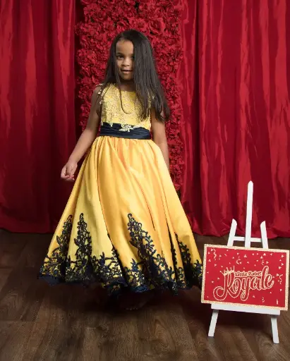 Sleeveless Lace applique princess ball gown with satin belt and scoop neckline
